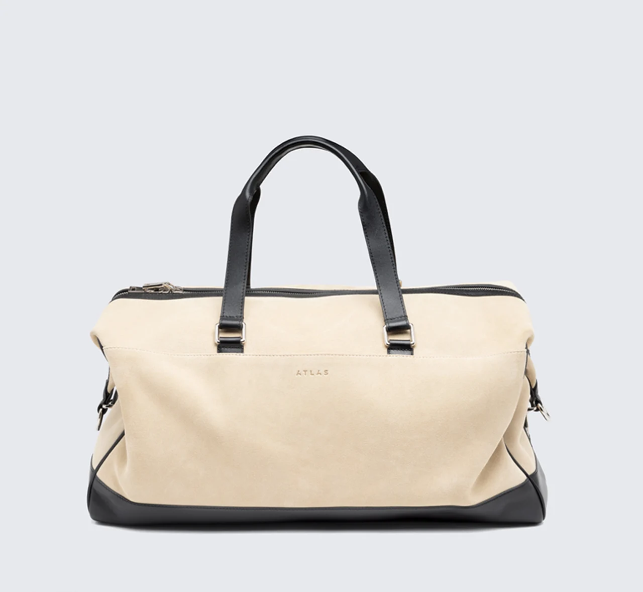 Cream leather travel bag with black handles