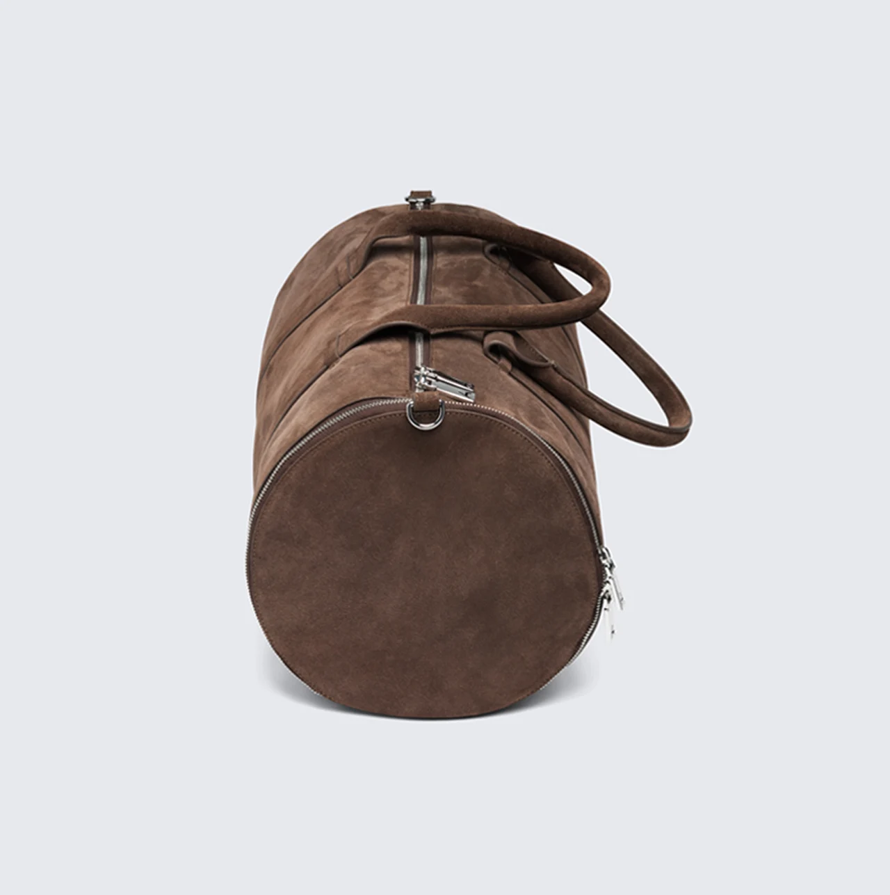 End view of a brown leather travel bag